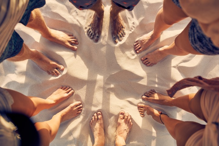 image of feet standing in a a circle